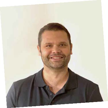 Headshot of Associate Professor Luke Burchill