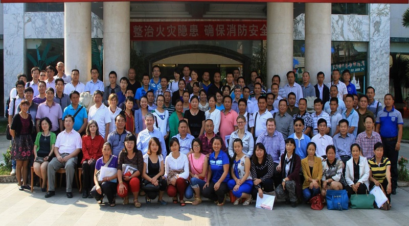 Professor McManus (seated 5th from left) with his scientific collaborators, medical technicians and field workers attending a workshop in Yunnan Province, China