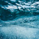 Underwater splash with bubbles