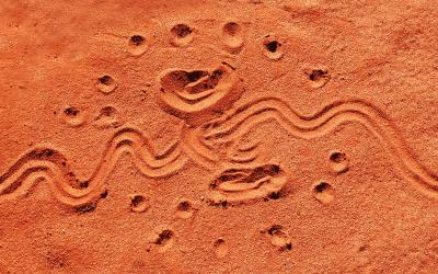 Indigenous print in sand