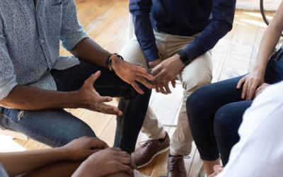 African man counselor speak at group counseling therapy session