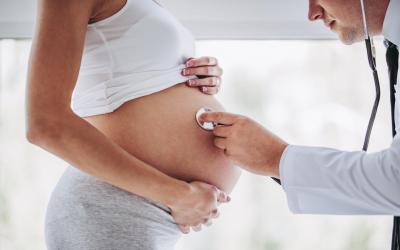 Pregnant lady with doctor